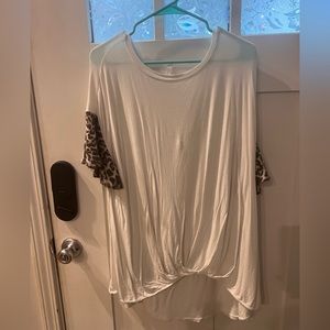 Cream top with cheetah print arm detail